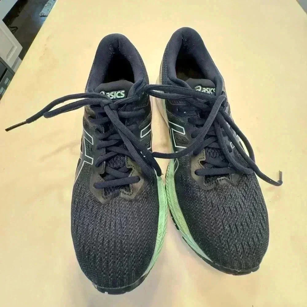 ASICS navy blue and light green running shoes. Women’s 8.5